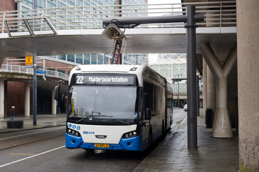 Where to Stay for Amsterdam Dance Event: 2026’s Top Areas & Insider Tips 15 Close-up of the Blue and white city GVB bus in Amsterdam, Netherlands