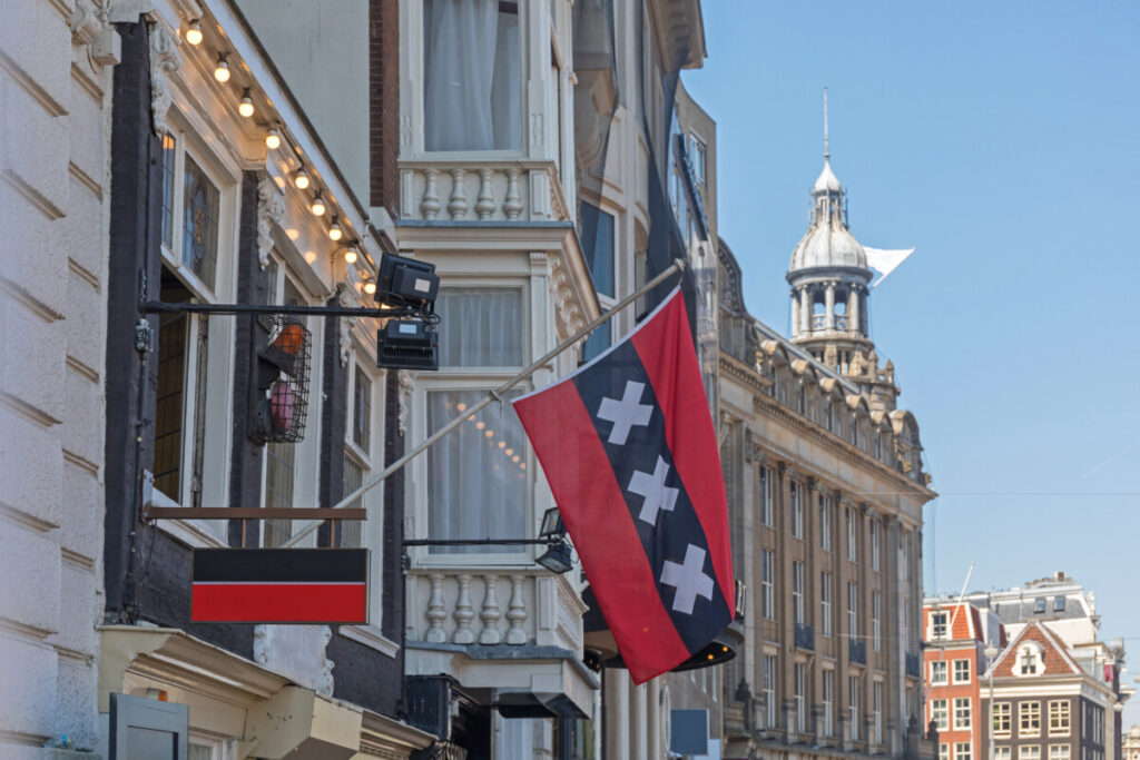 Flag of Amsterdam: 3 Striking Symbols Unveiled 4 The Amsterdam flag at a building in Amsterdam, Netherlands
