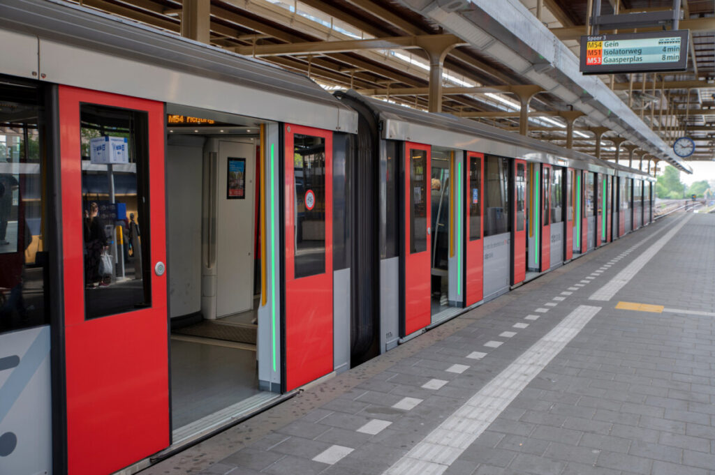 Solo Travel in Amsterdam: A Guide to Exploring the City Alone 8 Metro with an open doors at the Amstel Train Station in Amsterdam, The Netherlands