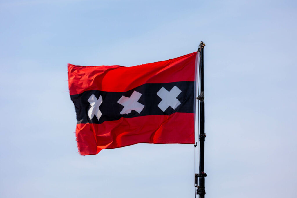 Flag of Amsterdam: 3 Striking Symbols Unveiled 2 Close-up of the Amsterdam official flag with three Saint Andrew's Crosses