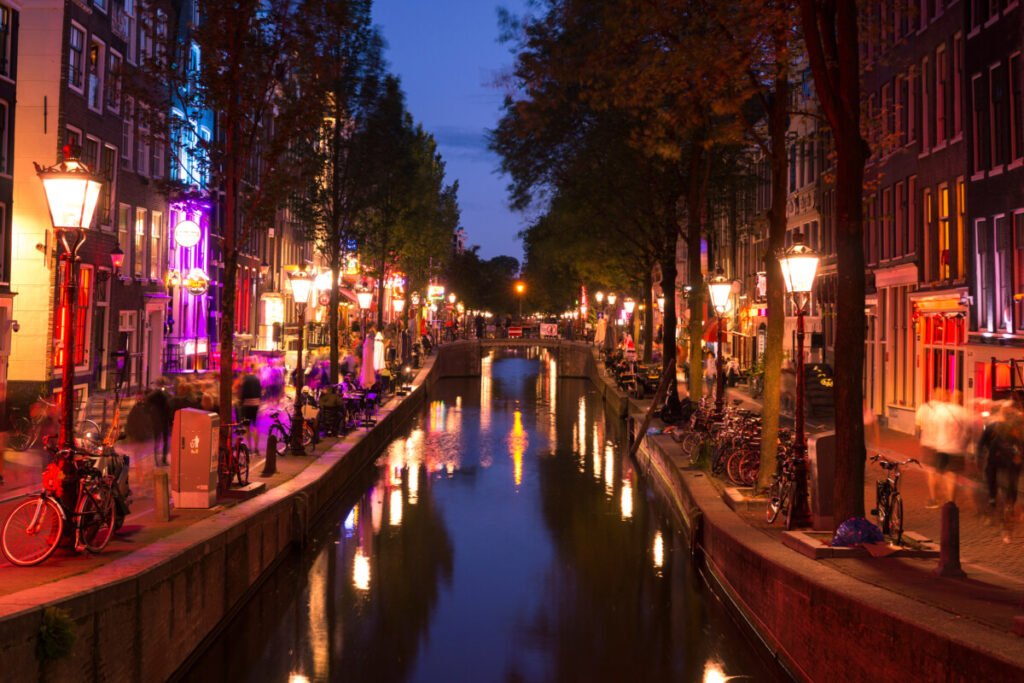 Exploring Amsterdam’s Red Light District: History, Etiquette, and Culture 9 Night view and the establishments of the Red Light District in Amsterdam, Netherlands