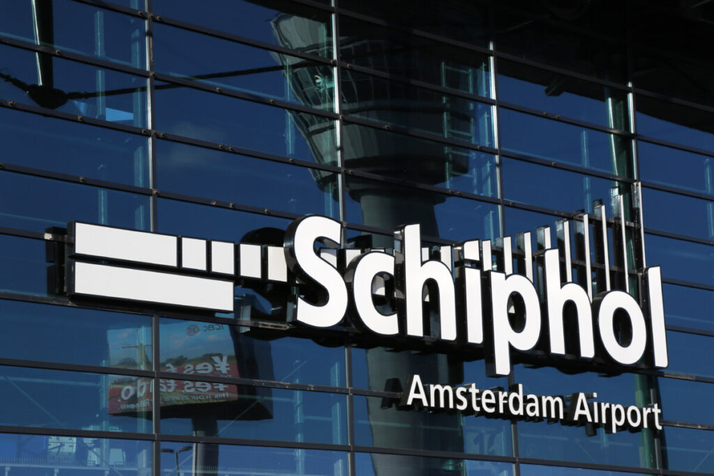 Cheap Flights from Amsterdam Schiphol: Discover Savings on Your Next Adventure 2 Amsterdam Airport Schiphol sign at the terminal entrance