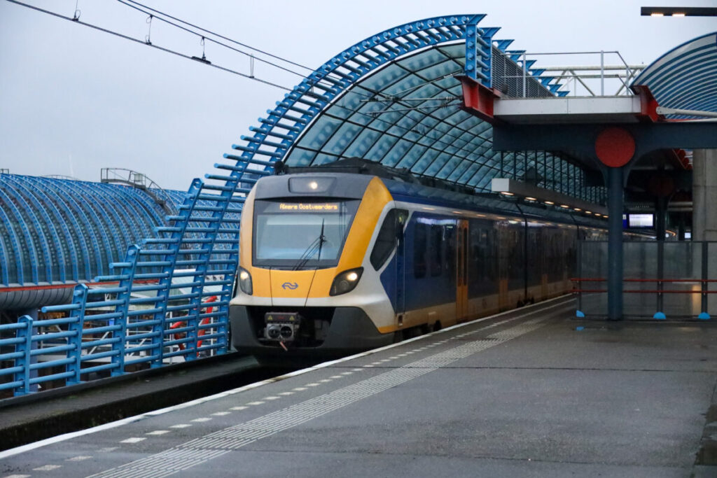 Amsterdam Airport Train vs Taxi: Which Is Better in 2026? 7 NS Sprinter train at Amsterdam Sloterdijk station