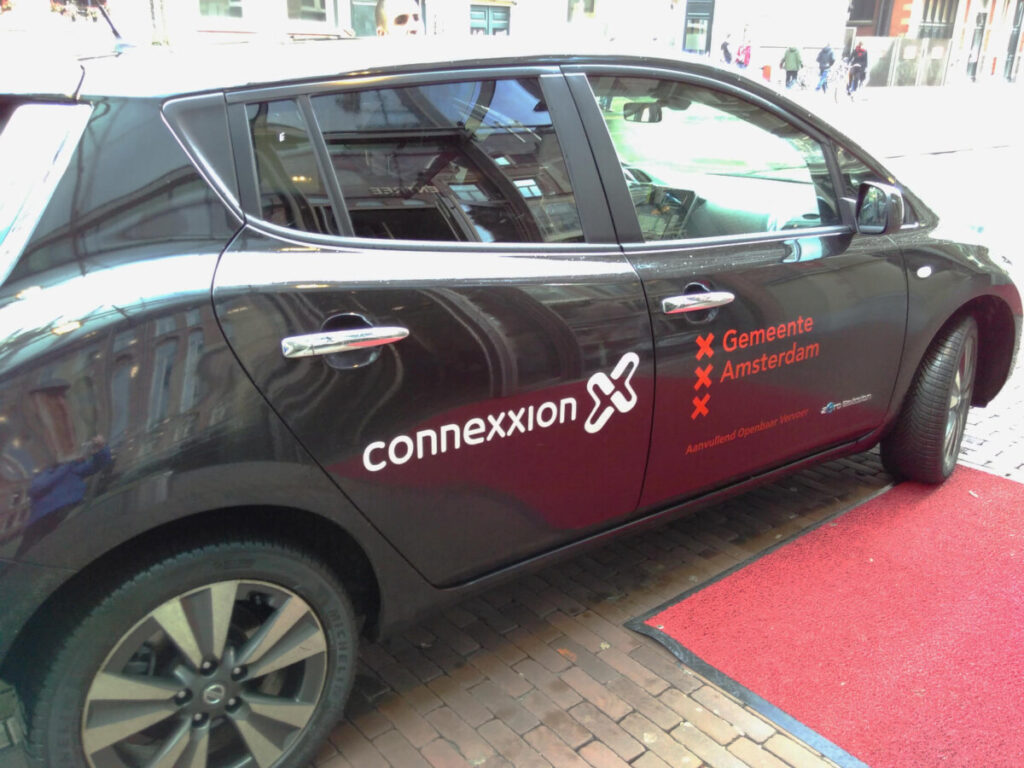 Navigate Amsterdam Like a Pro: 6 Transport Blunders to Avoid 4 Close-up of a black taxi in Amsterdam, Netherlands