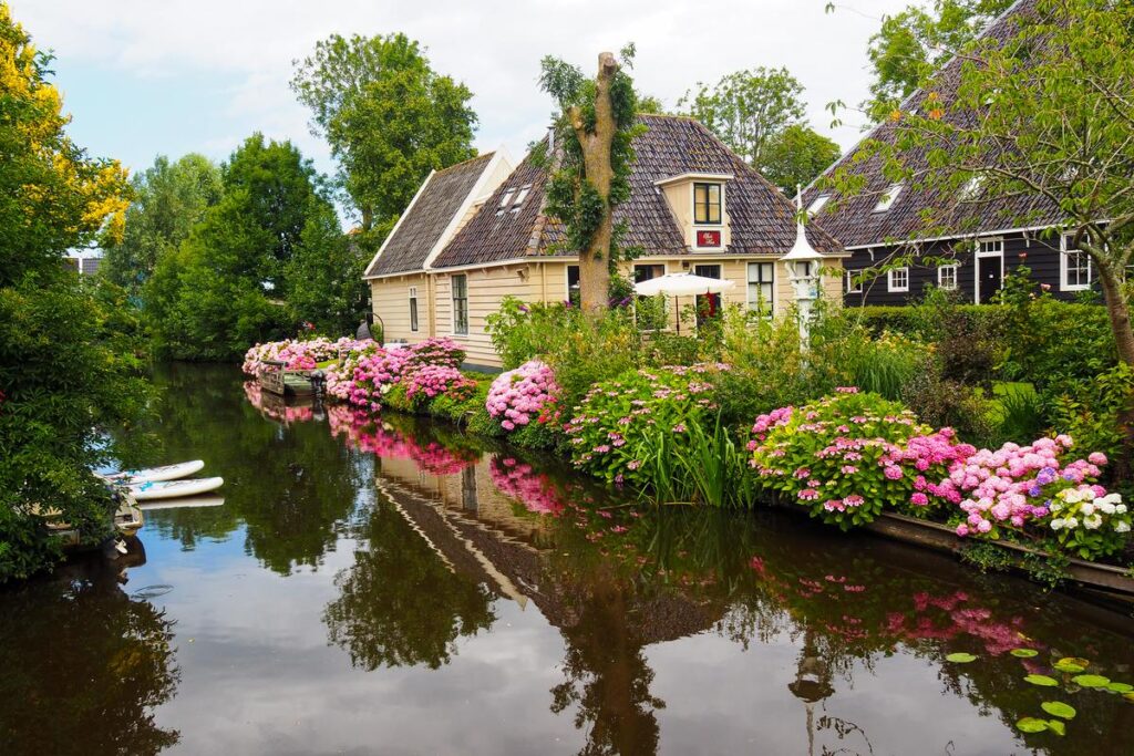 Waterland: Exploring Amsterdam's Rural Backyard 2 Charming Village of Broek in Waterland With Canal Hydrangeas And Traditional Architecture