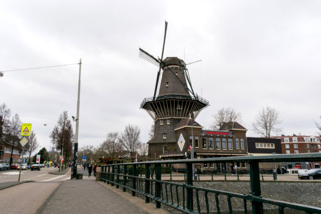 17 Unusual Ways to Explore Amsterdam 13 The architecture of De Gooyer Windmill and skyline in Amsterdam, Netherlands