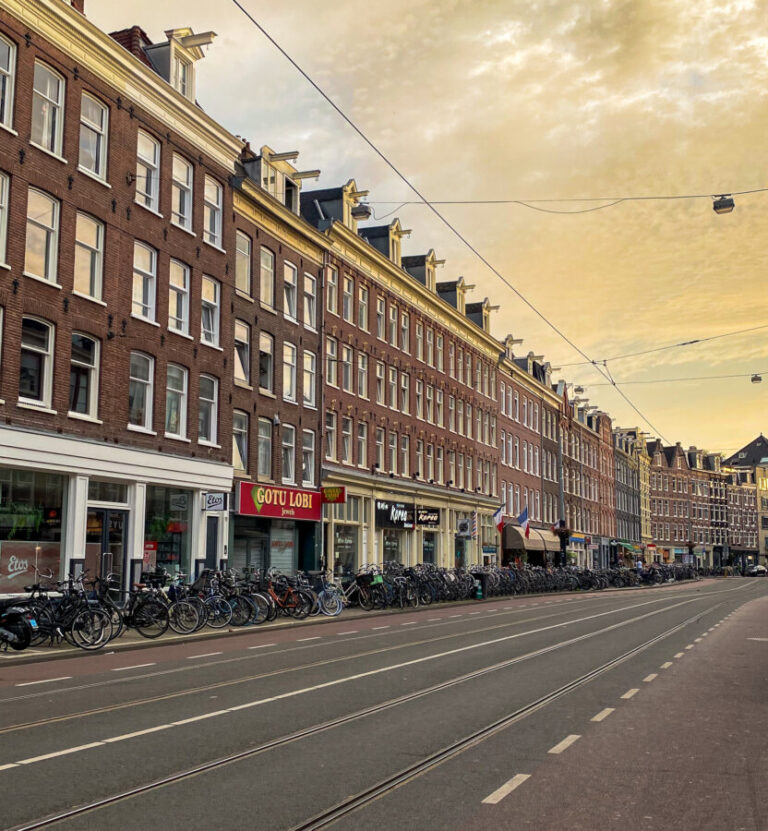 Sunset view at the street at De Pijp District, Amsterdam, Netherlands