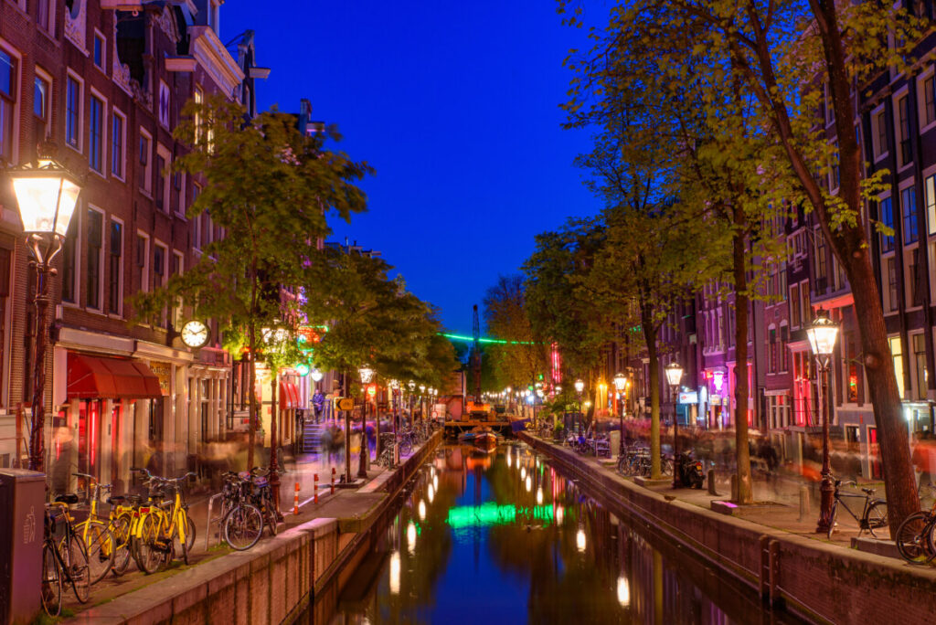 Exploring Amsterdam’s Red Light District: History, Etiquette, and Culture 7 Night view and the establishments of the De Wallen Red Light District in Amsterdam, Netherlands