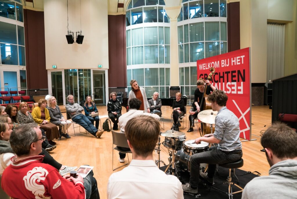 Families taking part in an interactive Junior Grachtenfestival workshop in Amsterdam