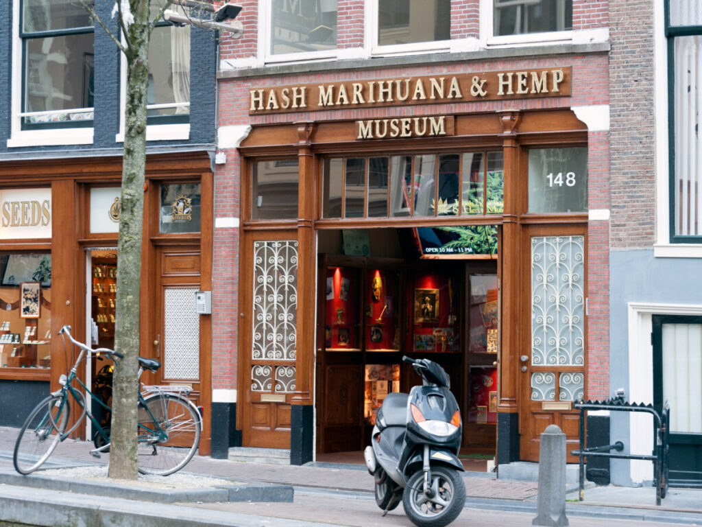 Exploring Amsterdam’s Red Light District: History, Etiquette, and Culture 3 Front and entrance of the Hash Marihuana and Hemp Museum on Oudezijds Achterburgwal in Amsterdam, Netherlands