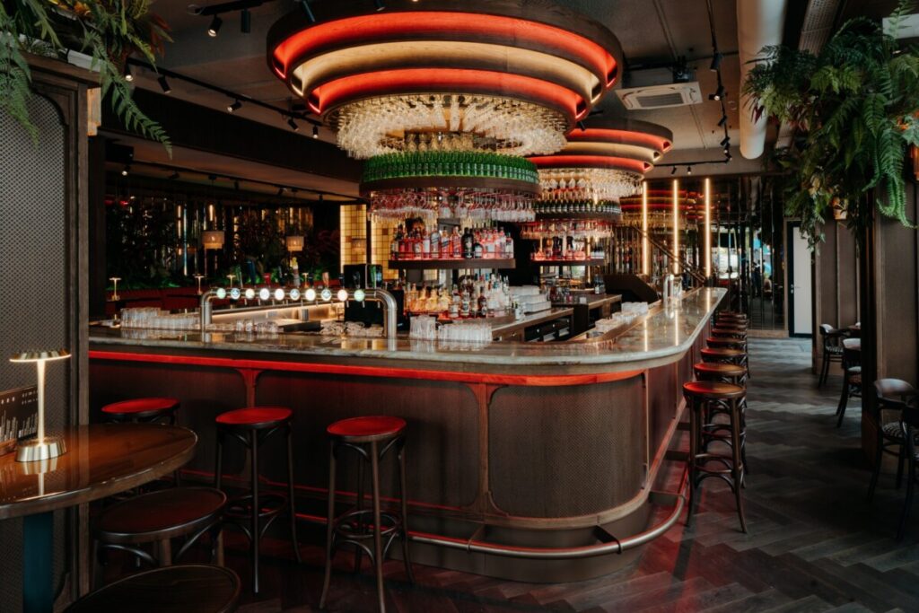 11 Best Places to Drink Authentic Heineken on Draft in Amsterdam: A Local's Guide 6 Interior of the Heineken Hoek in Amsterdam