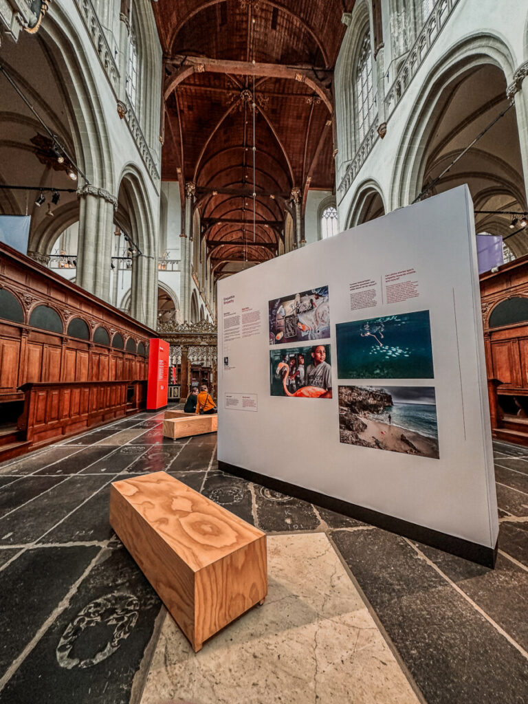 The New Church (De Nieuwe Kerk) 7 Historic church exhibition featuring photographs, architecture, and Gothic design elements.