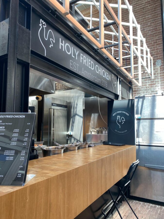Holy Fried Chicken eatery at Foodhallen with modern, clean design in Amsterdam
