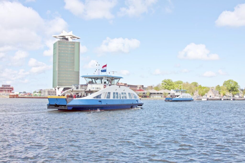 20 Insider Secrets for Exploring Amsterdam on a Shoestring: Your Ultimate Budget-Friendly Guide 11 Panoramic view of two ferries on the IJ in Amsterdam, the Netherlands