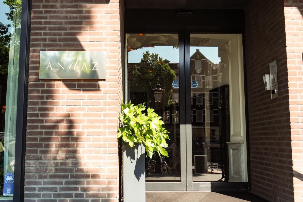 Andaz Amsterdam Prinsengracht - A Concept by Hyatt 4 Andaz Amsterdam Prinsengracht Hotel entrance with modern design and greenery