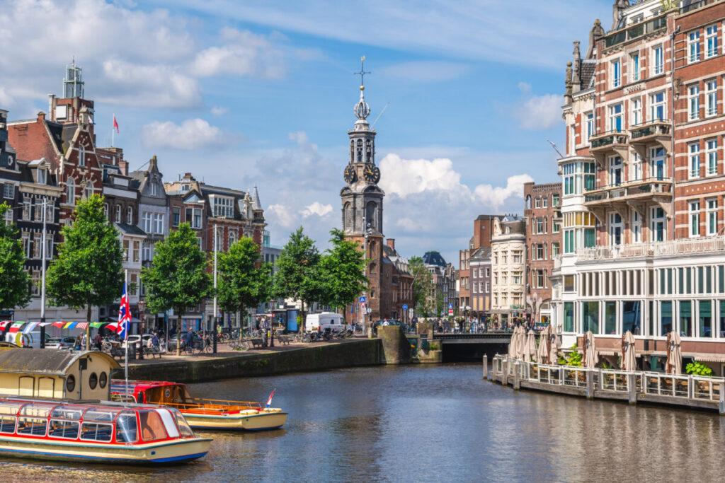 20 Insider Secrets for Exploring Amsterdam on a Shoestring: Your Ultimate Budget-Friendly Guide 23 The Munttoren or Mint Tower, stands tall in Muntplein square, Amsterdam, showcasing its historic charm and architecture