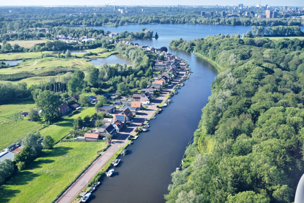 5 Best Cycling Routes in Amsterdam: Maps, Distances and Tips 5 Aerial view of Nieuwemeerdijk beside Nieuwe Meer in Amsterdam