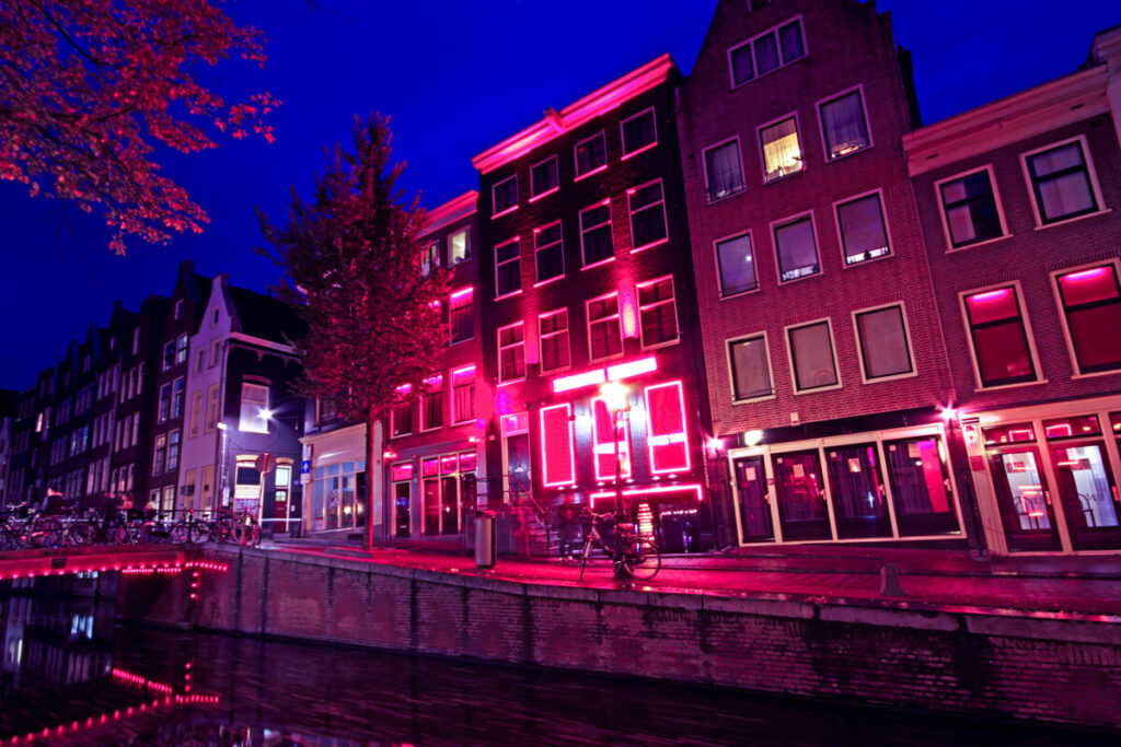 Exploring Amsterdam’s Red Light District: History, Etiquette, and Culture 5 Night lights and establishments at the Red Light District in Amsterdam, the Netherlands
