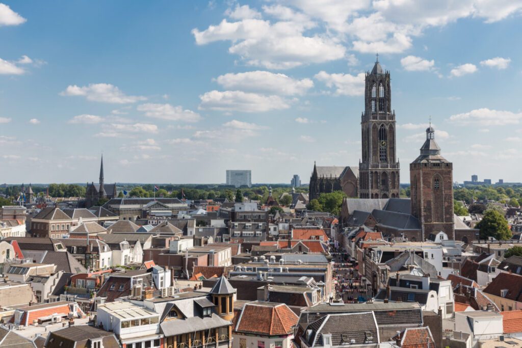 Aerial view of Utrecht, Netherlands, showcasing its medieval architecture and city layout amidst green spaces