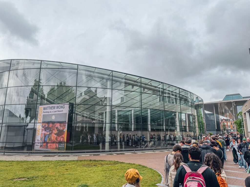 20 Insider Secrets for Exploring Amsterdam on a Shoestring: Your Ultimate Budget-Friendly Guide 5 Visitors waiting in line outside Van Gogh Museum, Amsterdam, Netherlands