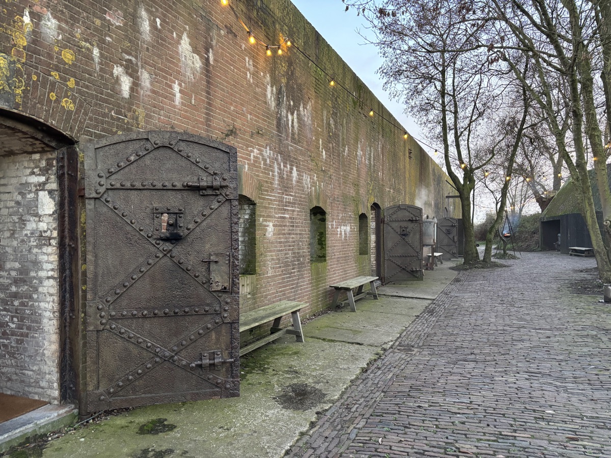 Vuurtoreneiland 8 Heavy iron riveted doors and weathered brick facade of the 1880s Defence Line fort on Vuurtoreneiland