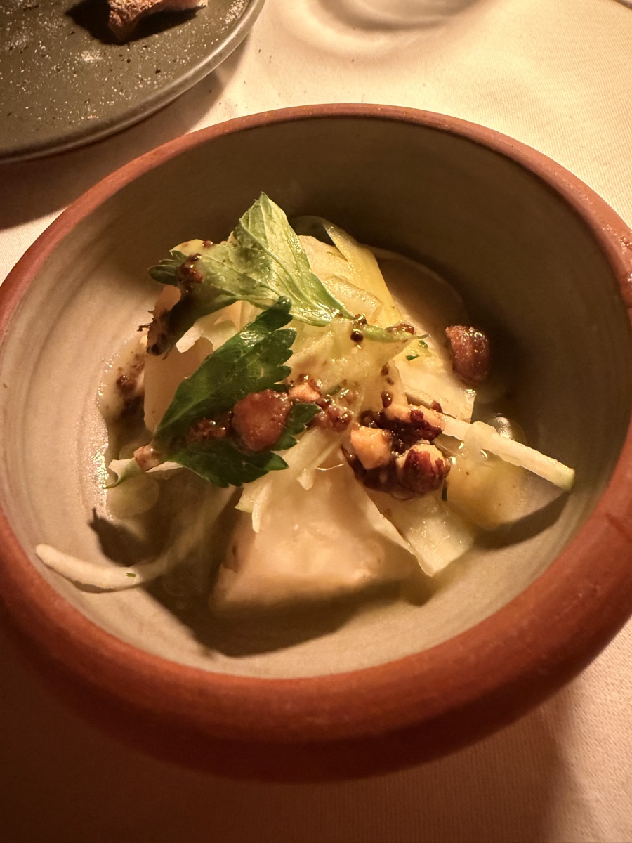 Vuurtoreneiland 12 Earthenware bowl of tender roasted root vegetables with toasted hazelnuts and garden herbs
