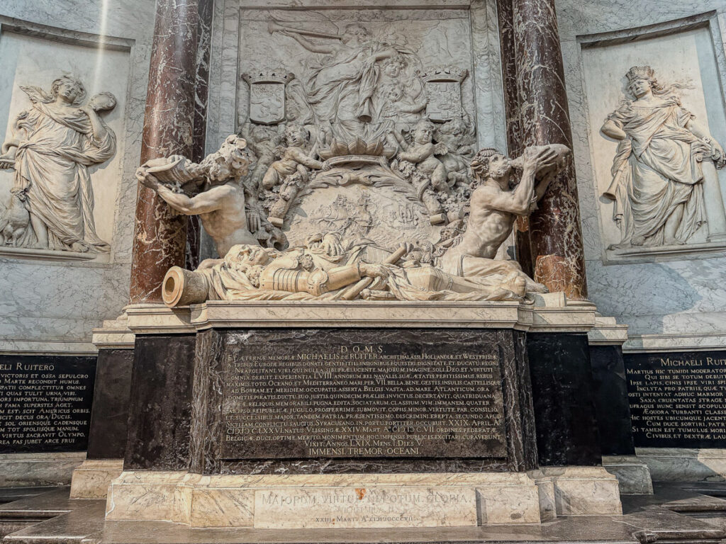 The New Church (De Nieuwe Kerk) 6 Grand baroque tomb sculpture with Latin inscriptions, reclining figure, river guardians, and marble columns.